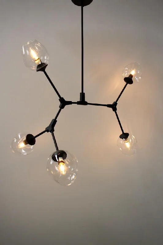 Chandeliers with Clear Crystal for a Sparkling EffectChandeliers with Clear Crystal for a Sparkling EffectMontclair Dimpled Glass Drop Pendant Light