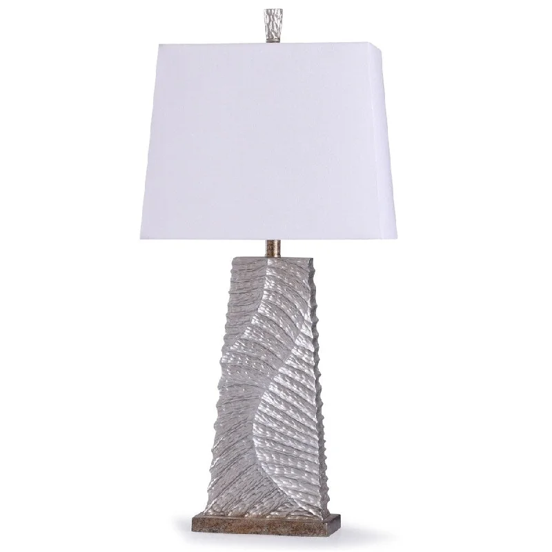 wooden table lamps with natural grain for a warm and organic feelwooden table lamps with natural grain for a warm and organic feelImperial Textured Silver Carved Twisted Table Lamp with Off-White Tapered Rectangle Shade